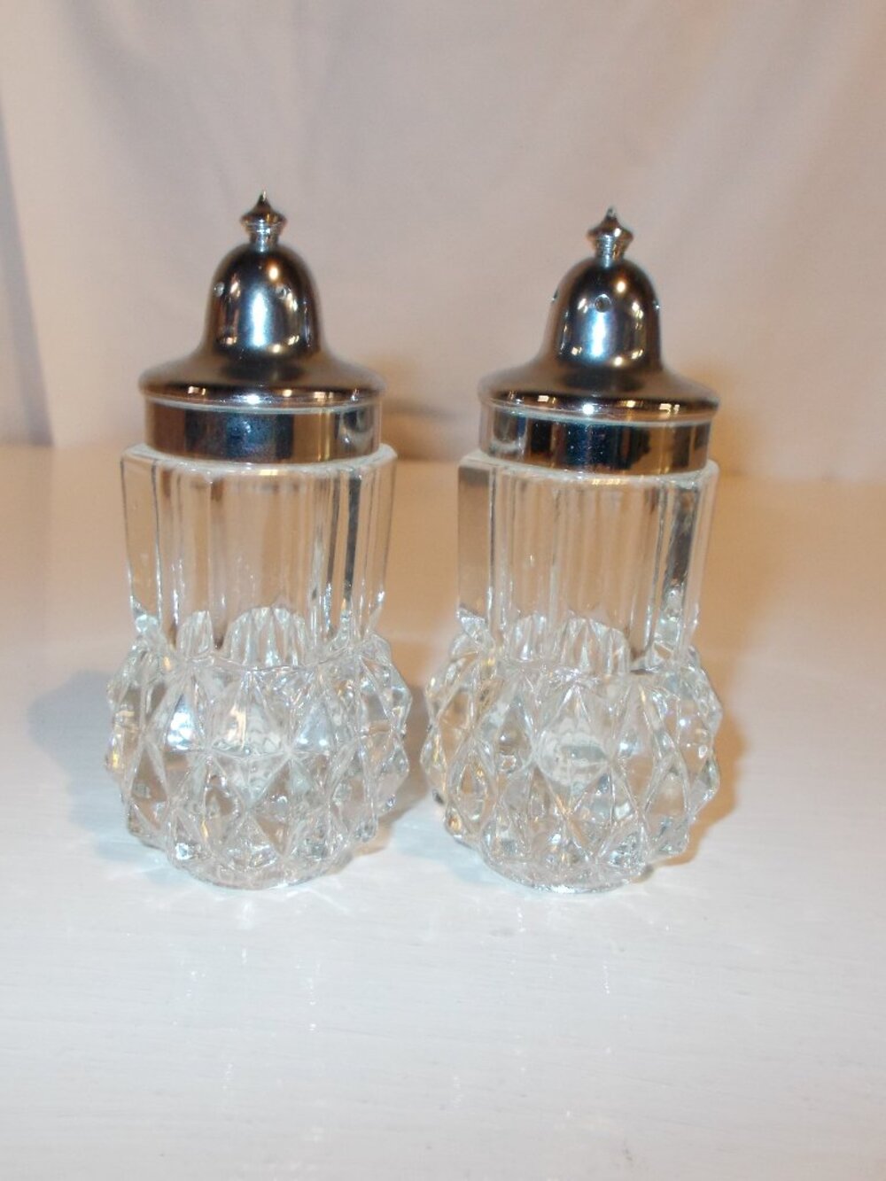 Vintage clear glass salt and pepper shakers, diamond cut w/tiara top